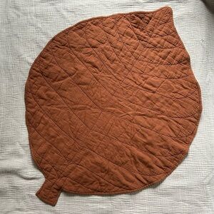 Kate Quinn Leaf-Shaped Quilted Mat in Rust